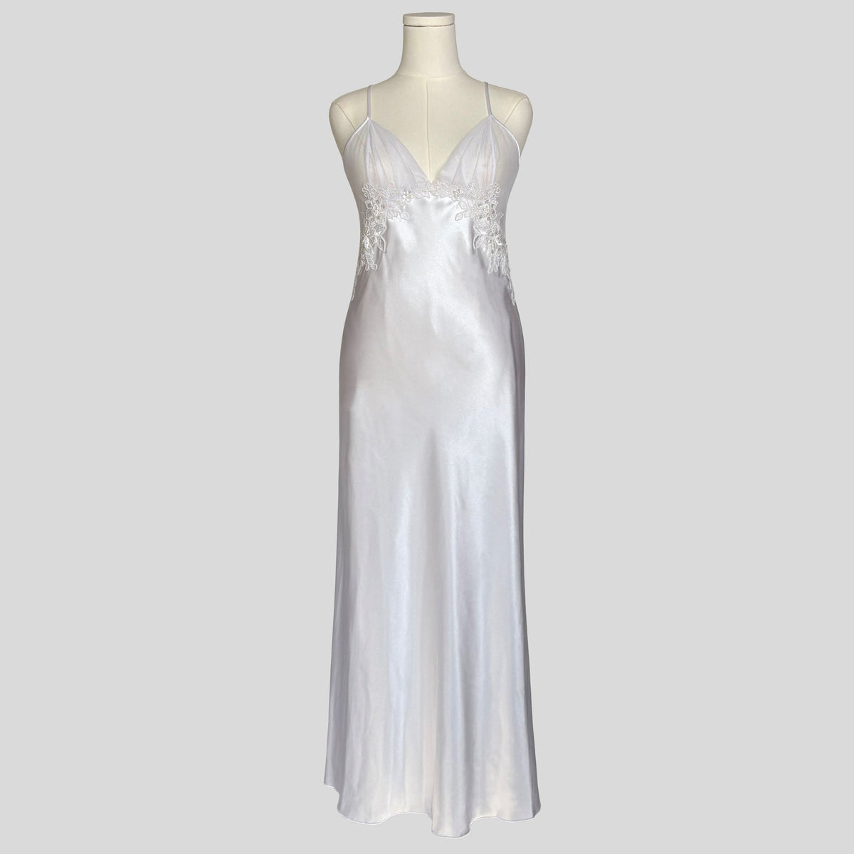 Backless floral appliqué bridal gown