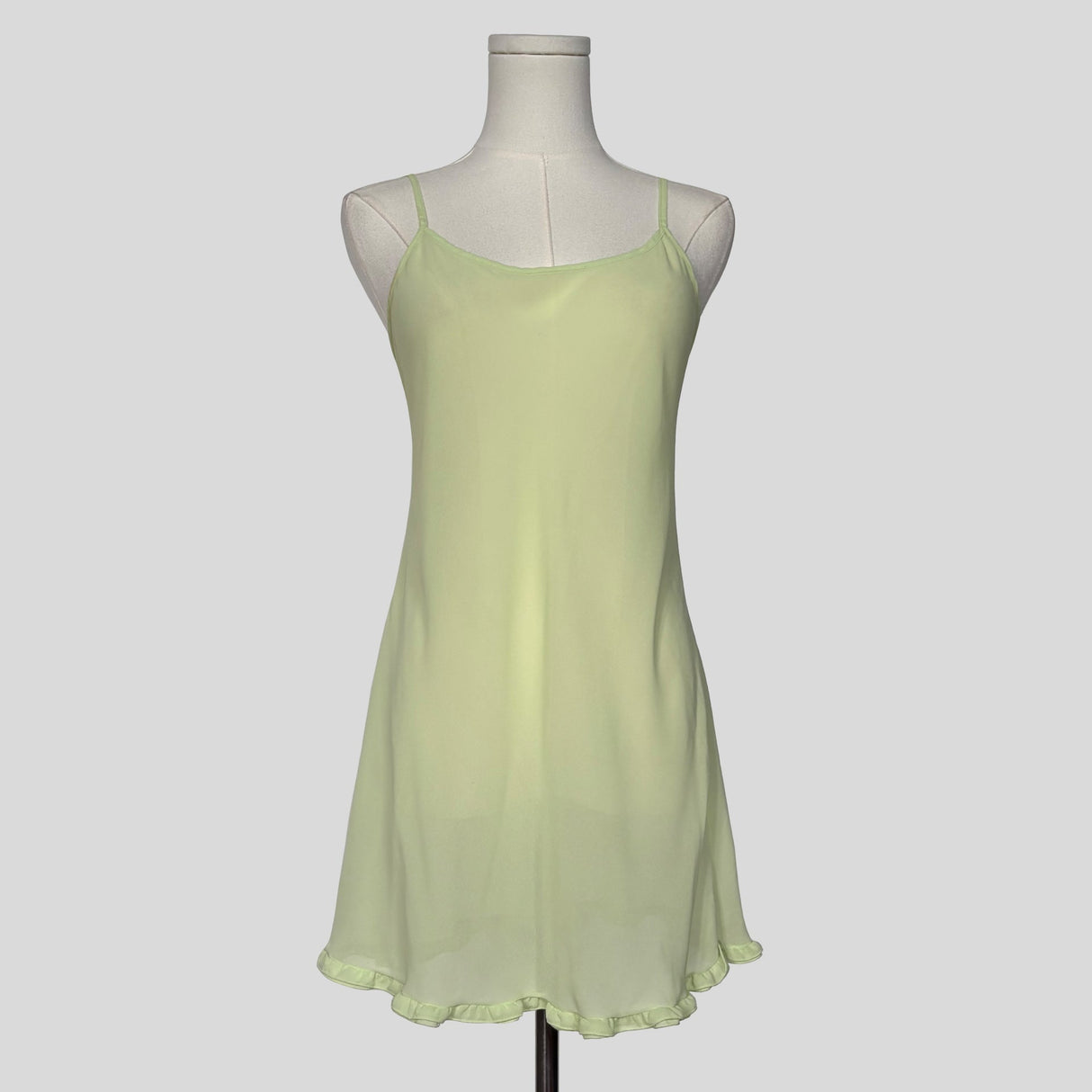 Sheer ruffle hem slip in lime