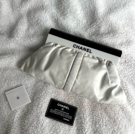Chanel white leather resin logo clutch bag