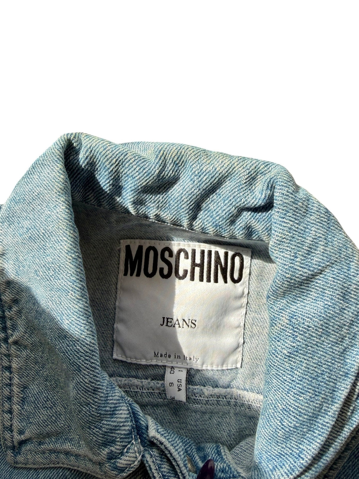 Moschino denim vest with white lace up details