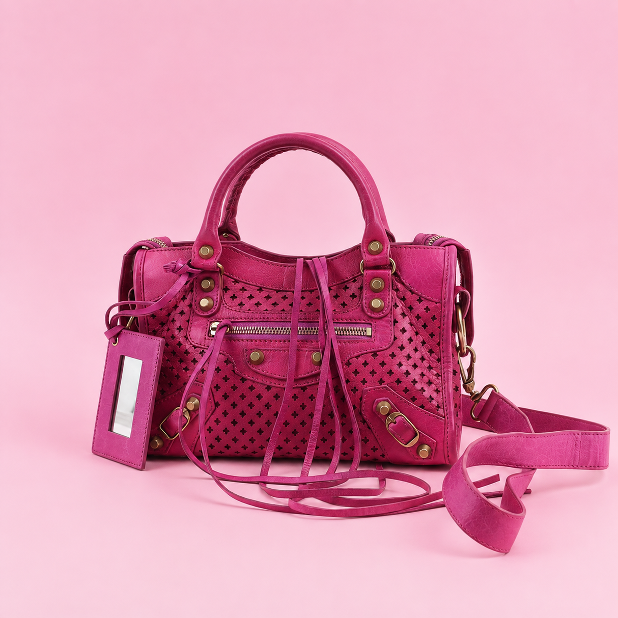 Balenciaga Perforated Mini City Bag in Pink Leather