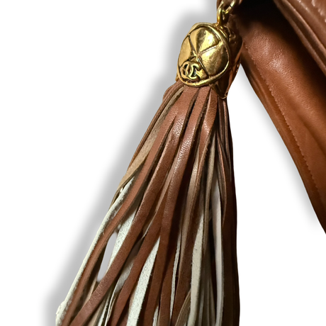 Chanel Vintage 80s authentic front flap shoulder bag cognac brown and white diamond pattern with tassel