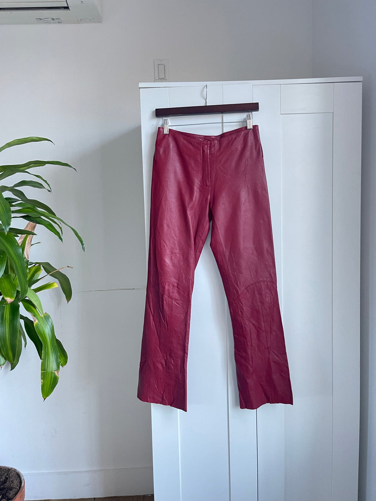 red lowrise leather pants