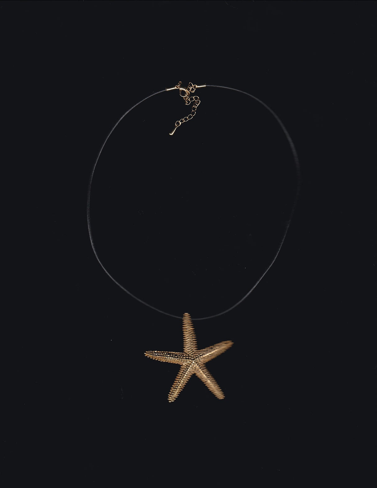 Gold Starfish and Black Rubber Cord Necklace