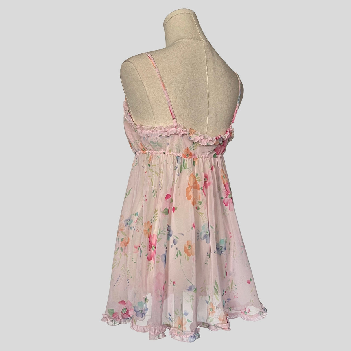 Sheer ruffled babydoll dress in pink floral
