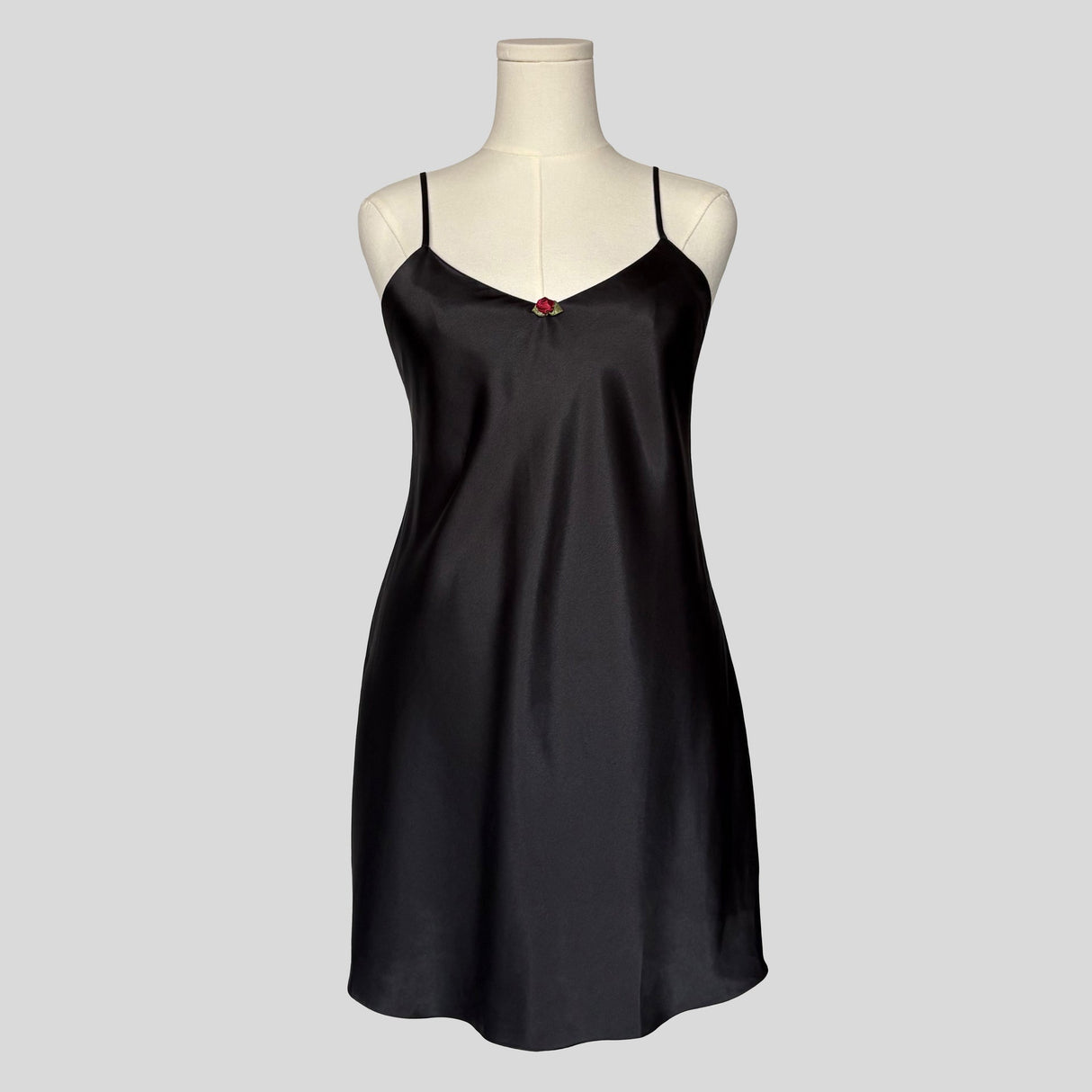 Silky rosette slip dress in black