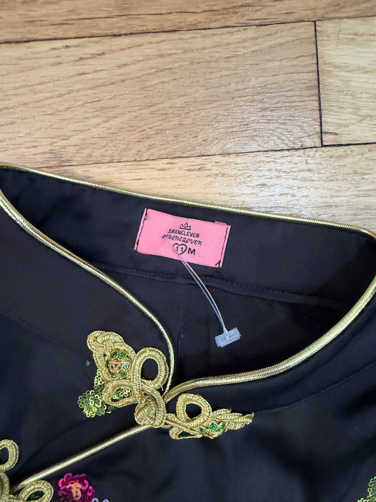 Black tang style top with floral details tuv #125678