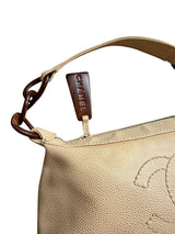 Chanel beige caviar leather bag with wood details