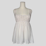 Country ruffled babydoll dress in white