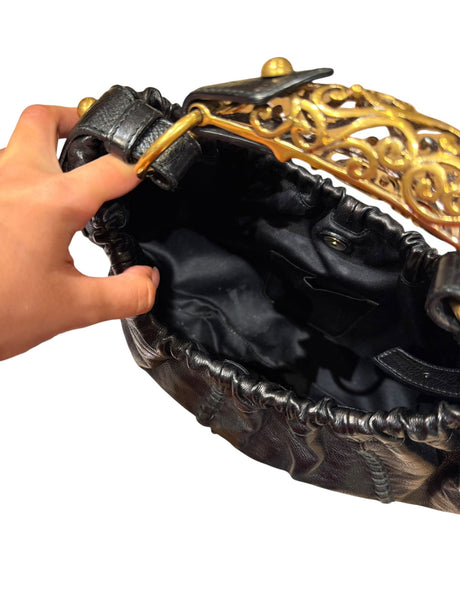 Yves Saint Laurent black Mombasa hobo bag with ornate gold metal handle