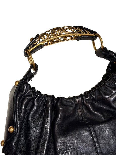 Yves Saint Laurent black Mombasa hobo bag with ornate gold metal handle