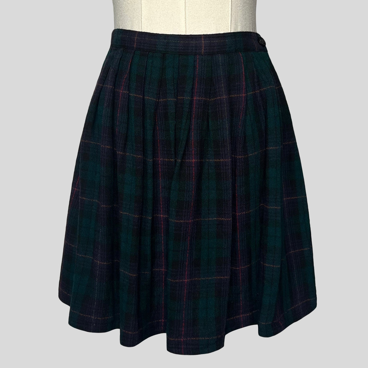 Pleated plaid mini skirt