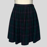 Pleated plaid mini skirt
