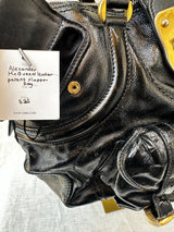 Alexander McQueen Patent leather flapper bag