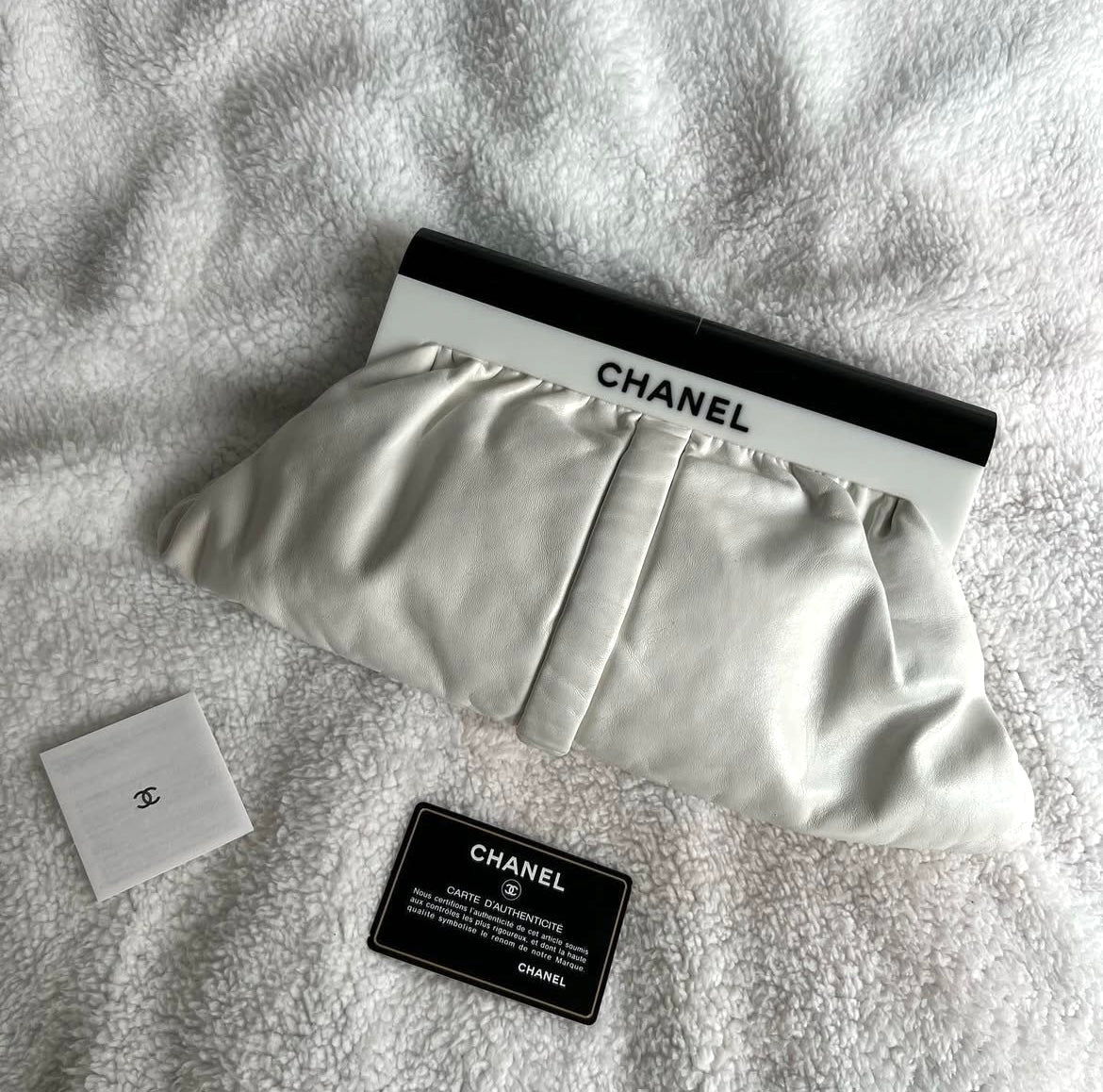 Chanel white leather resin logo clutch bag