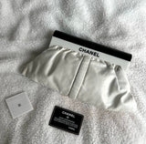 Chanel white leather resin logo clutch bag