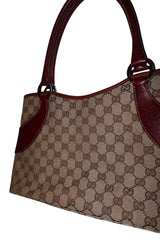 Gucci monogram shoulder bag with burgundy leather detail