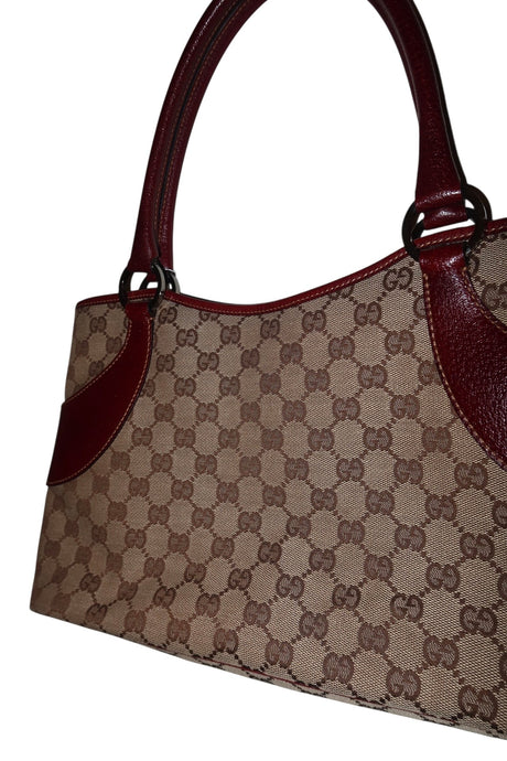 Gucci monogram shoulder bag with burgundy leather detail