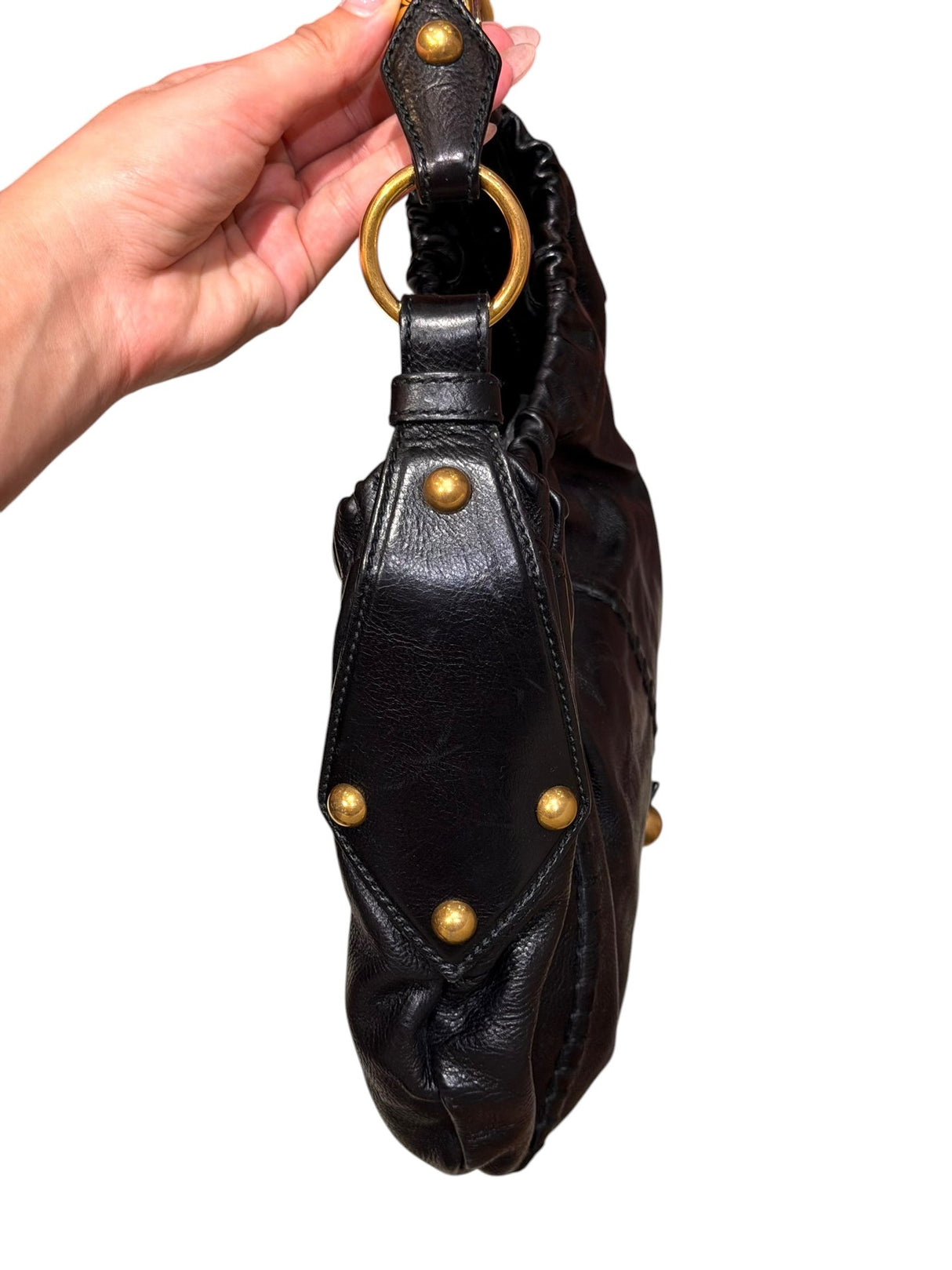 Yves Saint Laurent black Mombasa hobo bag with ornate gold metal handle