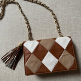Chanel Vintage 90s authentic front flap shoulder bag cognac brown and white diamond pattern with tassel