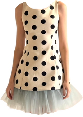 Polka dot dress with a tulle skirt on a white background