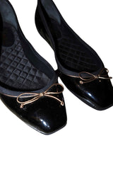 Yves Saint Laurent black patent leather ballerina flats with gold bows (36.5)