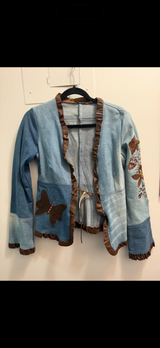 Denim jacket with leather trim and butterfly details as seen on Charmed