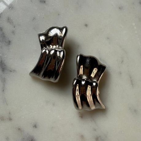Vintage authentic Givenchy Silver large ribbon wave style earrings
