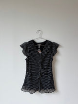 Silk polka dot ruffle top