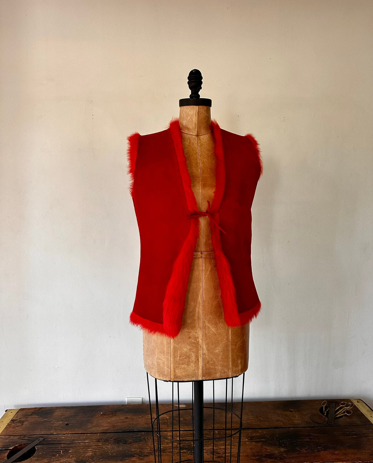 Hugo Buscati	Rouge suede and fur vest