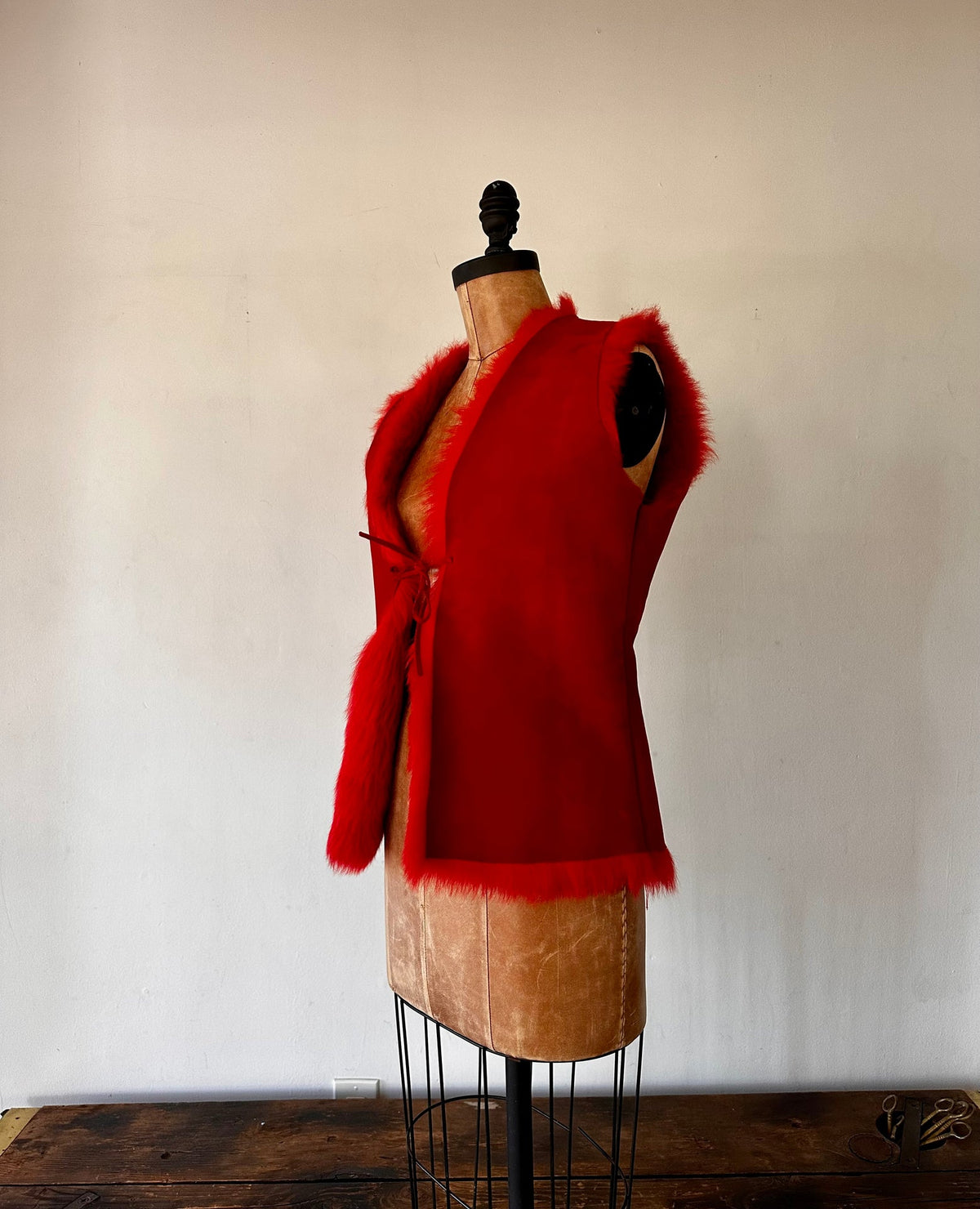Hugo Buscati	Rouge suede and fur vest