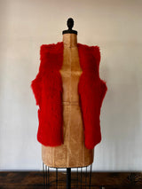 Hugo Buscati	Rouge suede and fur vest