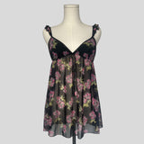 Ruffled babydoll dress in black floral