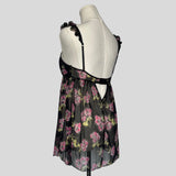 Ruffled babydoll dress in black floral