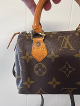 Louis Vuitton Mini Speedy w/ strap