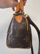 Louis Vuitton Mini Speedy w/ strap