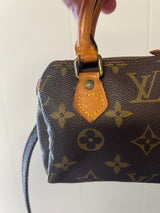 Louis Vuitton Mini Speedy w/ strap