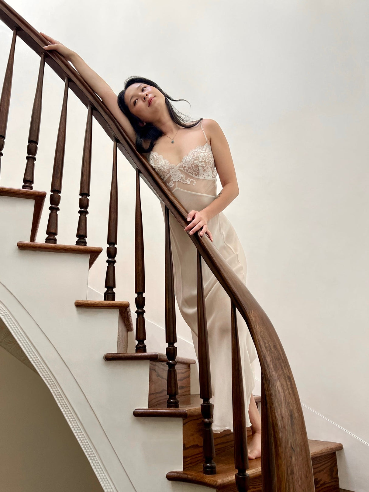 Delicate sheer lace gown in white