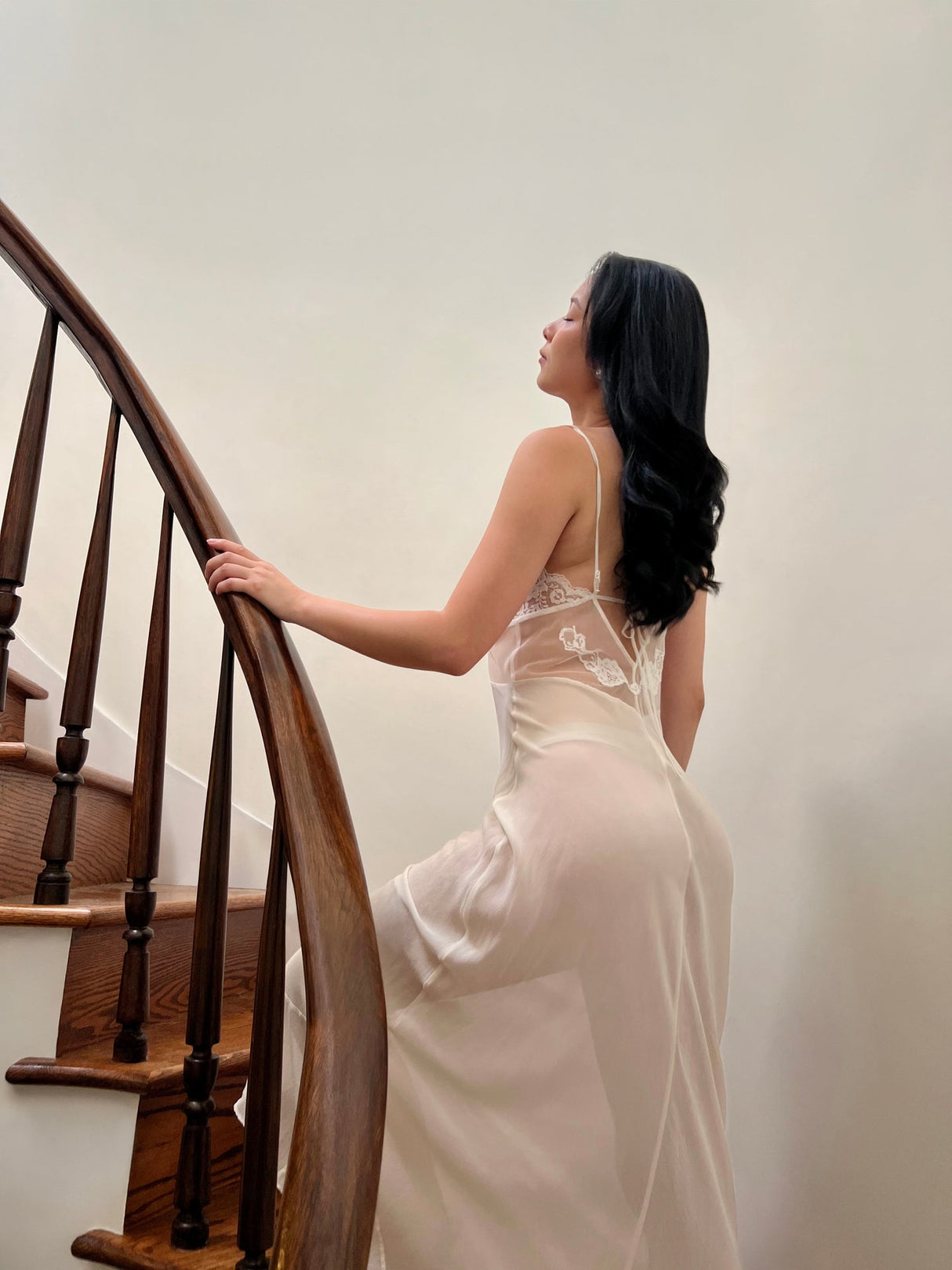Delicate sheer lace gown in white