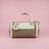 #19 gucci monogram barrel bag