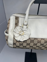 #19 gucci monogram barrel bag