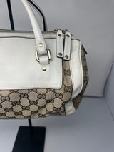 #19 gucci monogram barrel bag