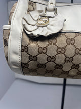 #19 gucci monogram barrel bag