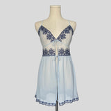 Sheer lace trim split front flyaway chemise in blue