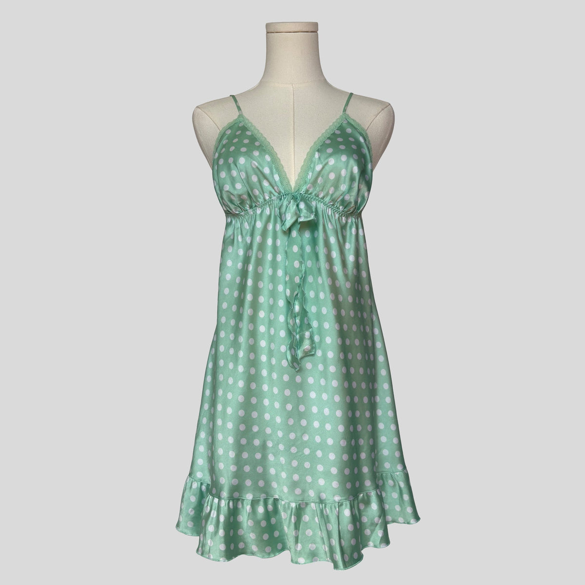 Silky polka dot ruffled slip in teal and white