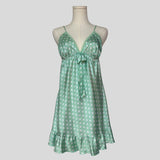 Silky polka dot ruffled slip in teal and white