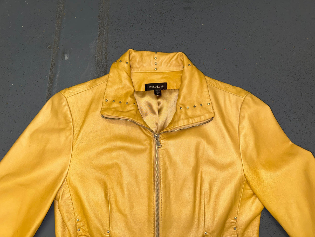 BEBE Gold Cropped Leather Jacket