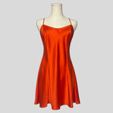 Silk slip dress in orange