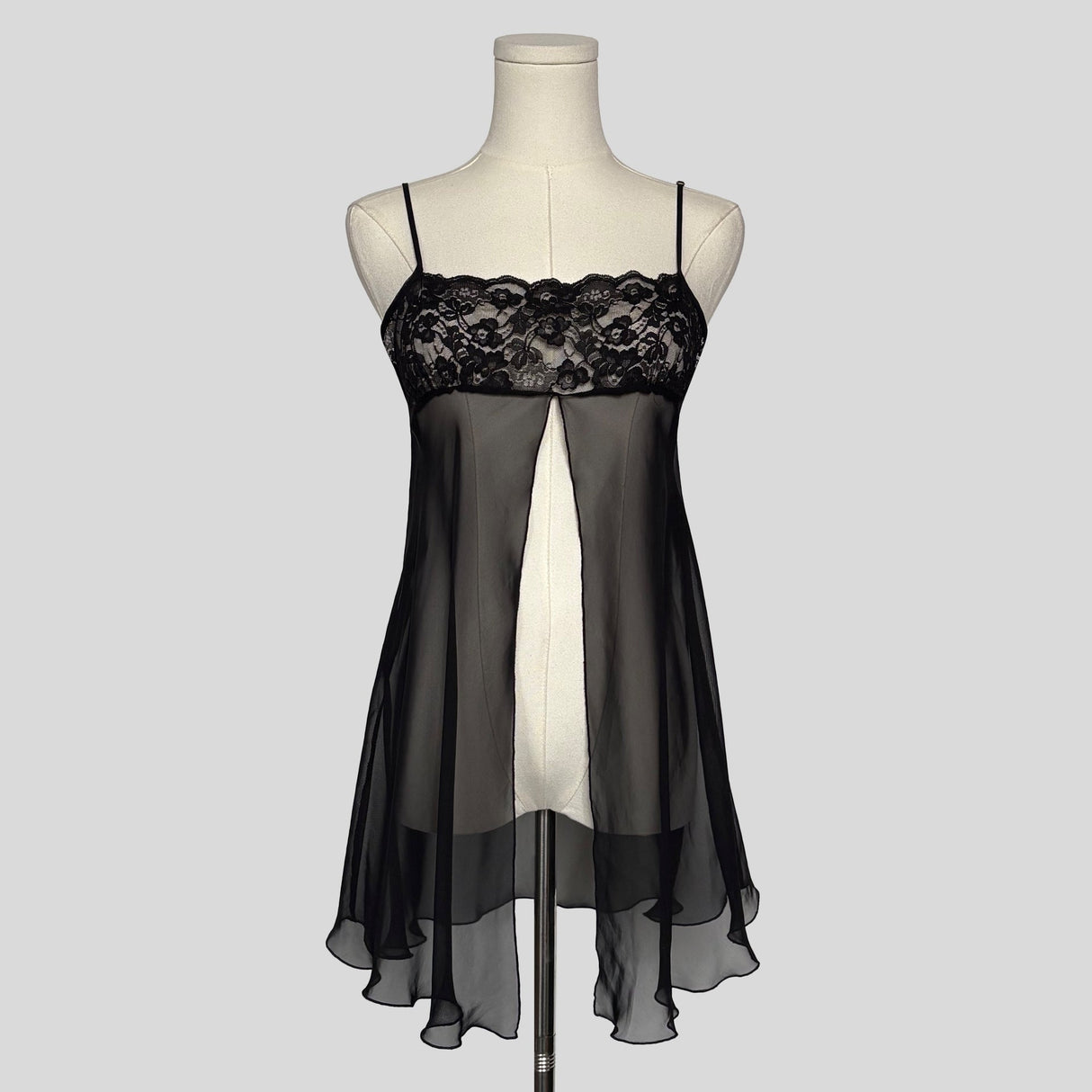Sheer lace trim split front babydoll dress in black
