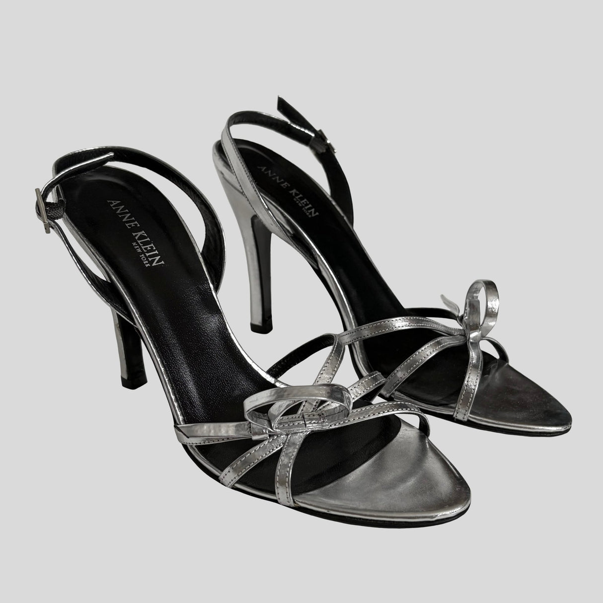 Silver stiletto slingback heels - size 7.5